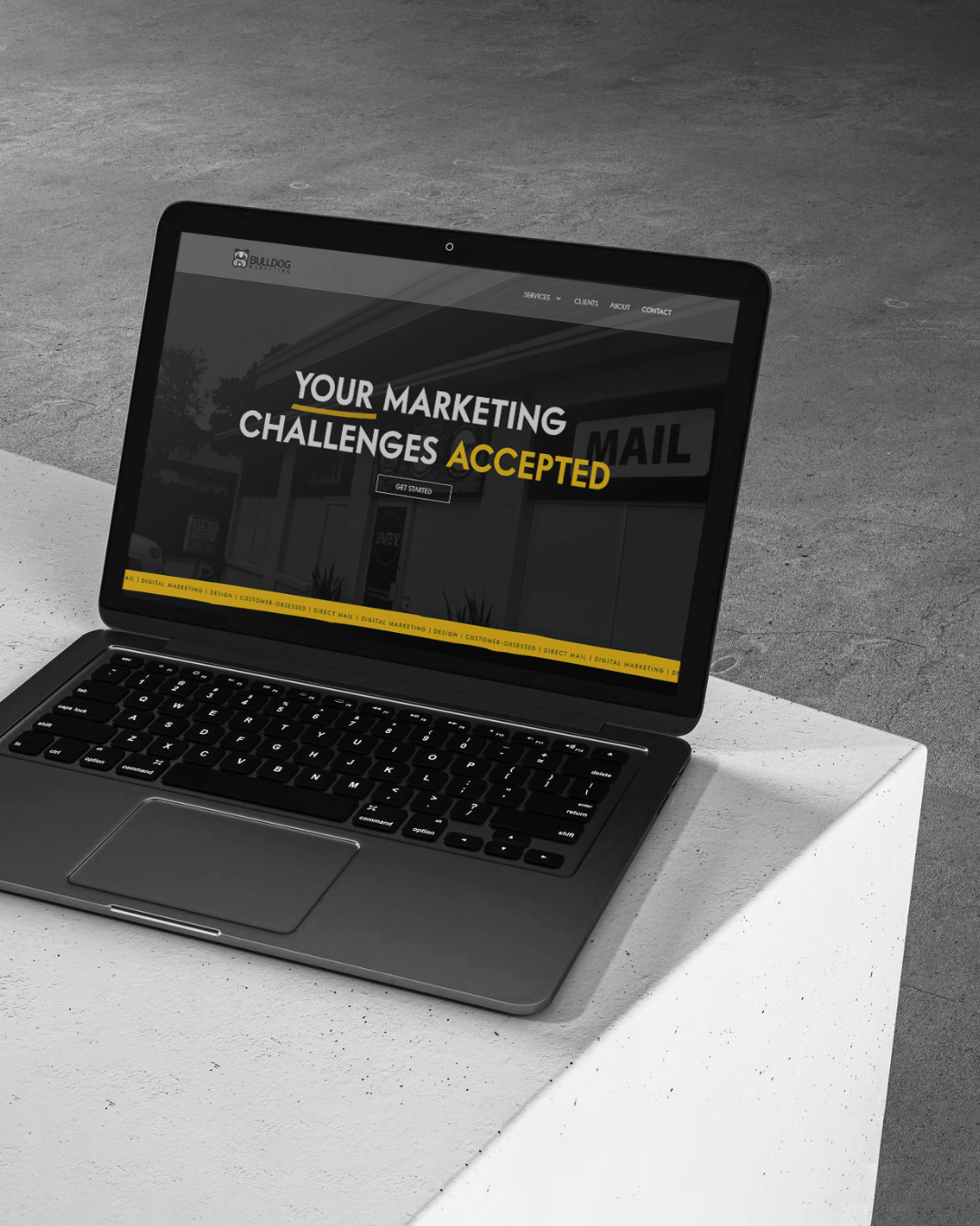 Bulldog Marketing agency website design homepage with black background and bold typography